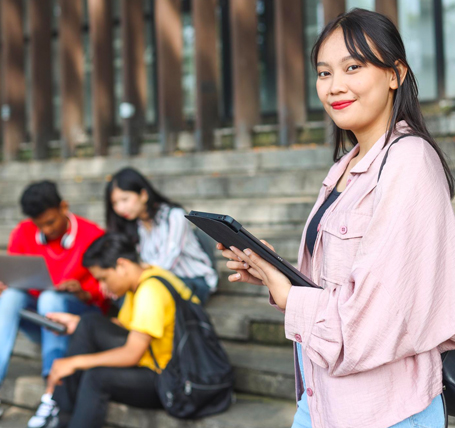 Communication Studies faculty working with students at SEGi University and Colleges